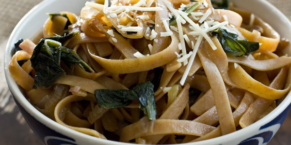 Fettuccine with Caramelized Onions & Mustard Greens