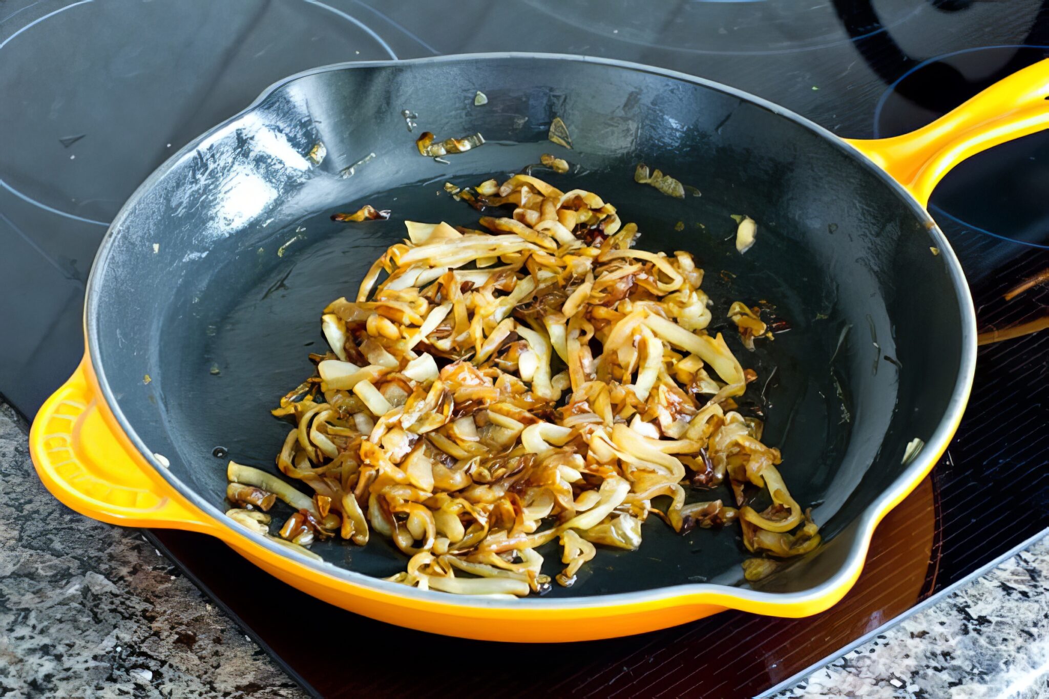 caramelized onions in a pan on the stovetop