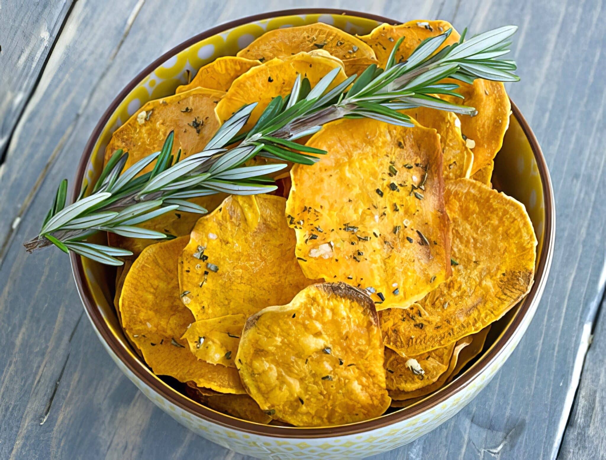 homemade baked sweet potato chips with garlic and rosemary
