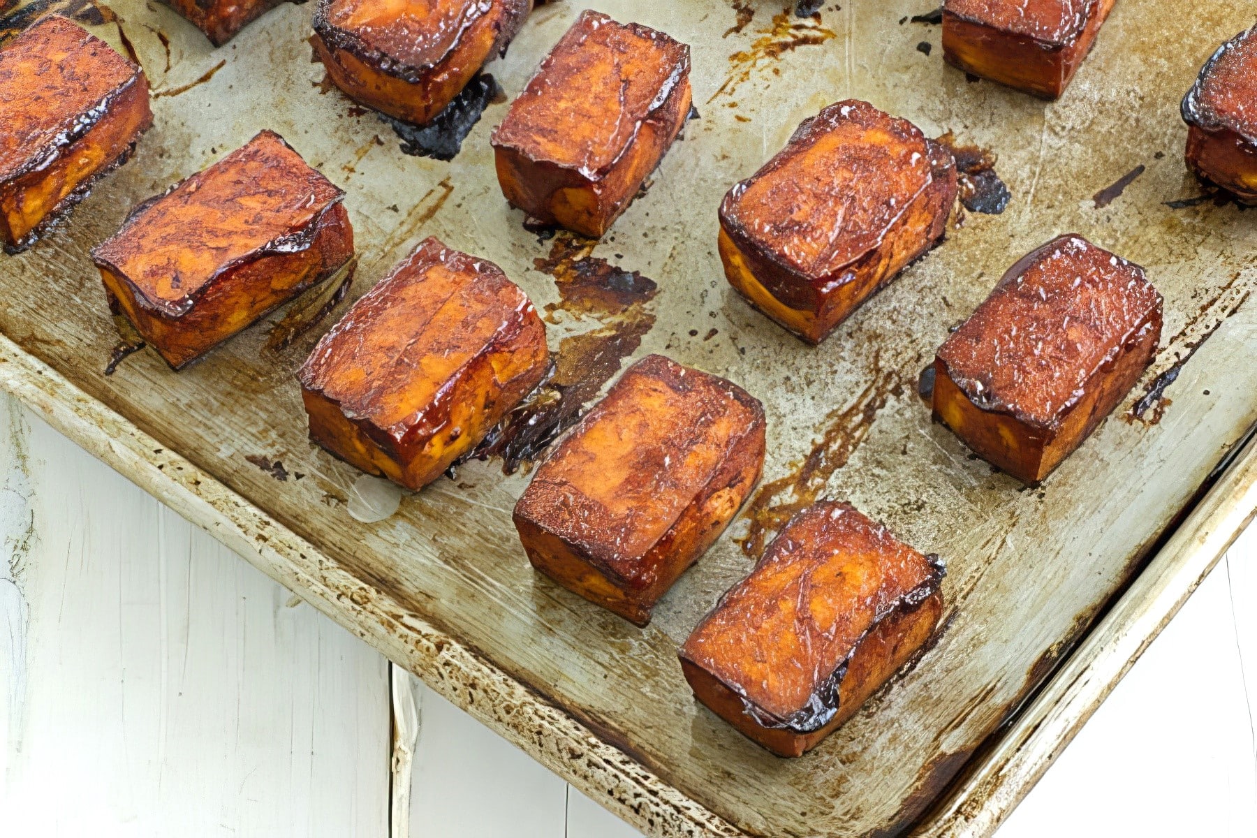 baked barbecue tofu on a baking sheet