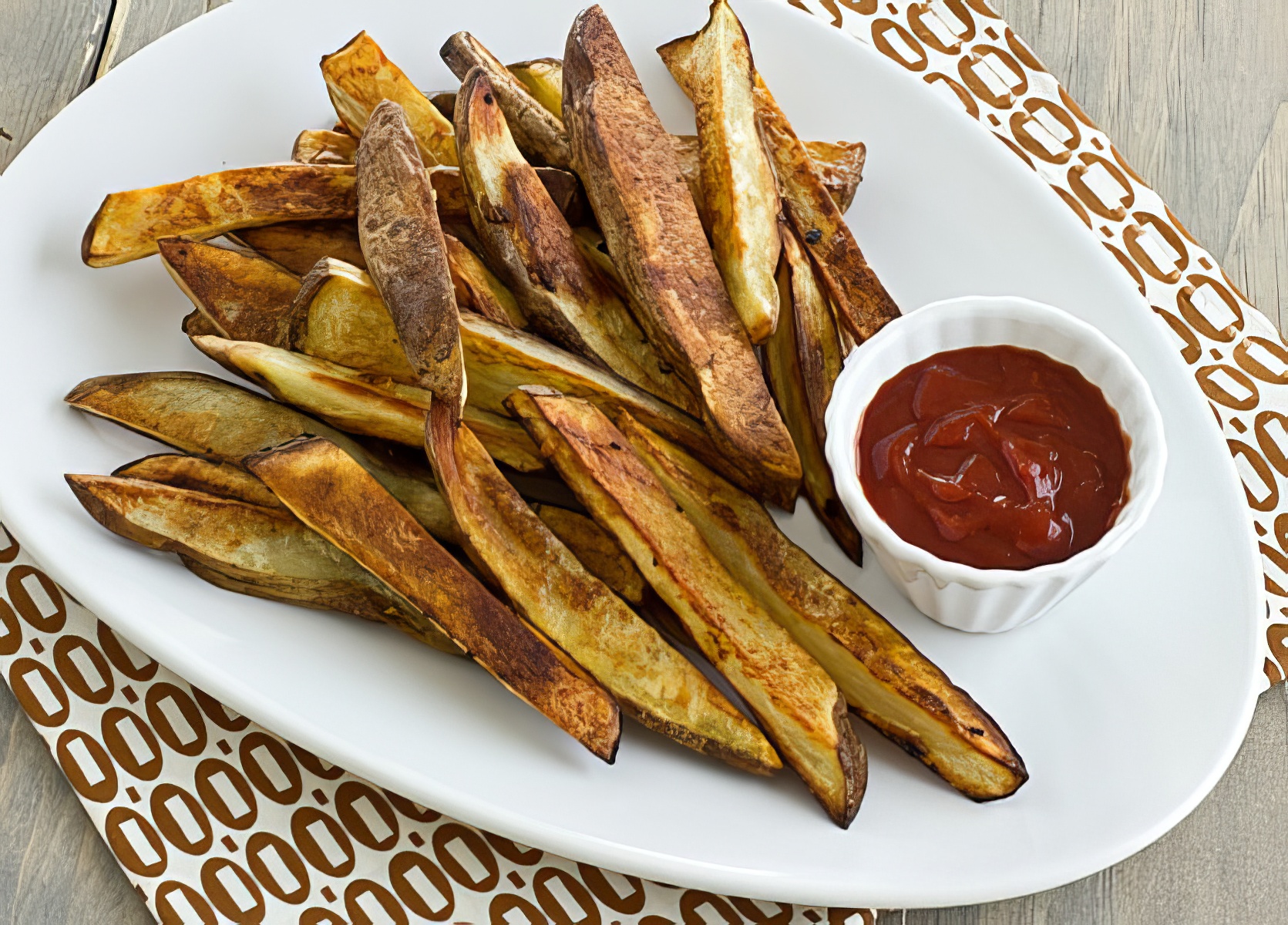 garlicky oven fries with harissa ketchup