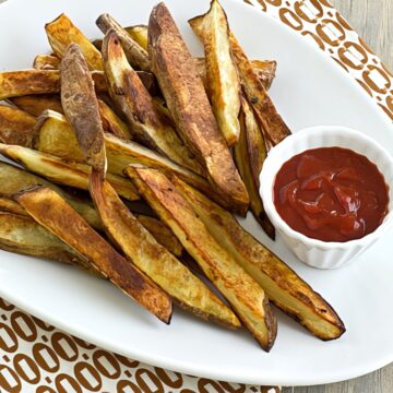 garlicky oven fries with harissa ketchup