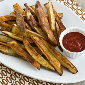 Garlicky Oven Fries with Harissa Ketchup Recipe