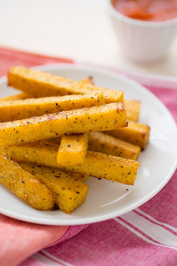 17 Delicious Vegetarian Dinners You Can Make with a Tube of Polenta: Baked Polenta Fries with Garlic Tomato Sauce