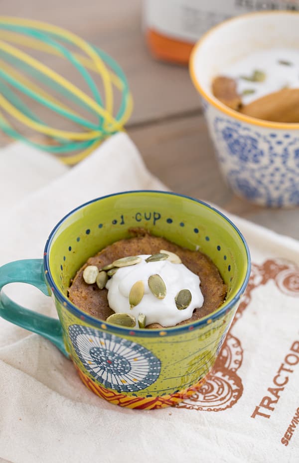 Sweet Potato Mug Cake being served in a colorful mug