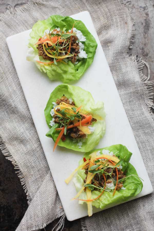 vegetarian lettuce wraps on a white plate