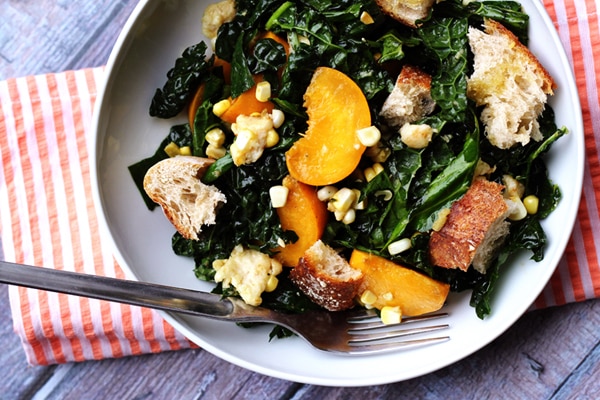 Kale Salad with Peaches, Corn, and Basil-Honey Vinaigrette