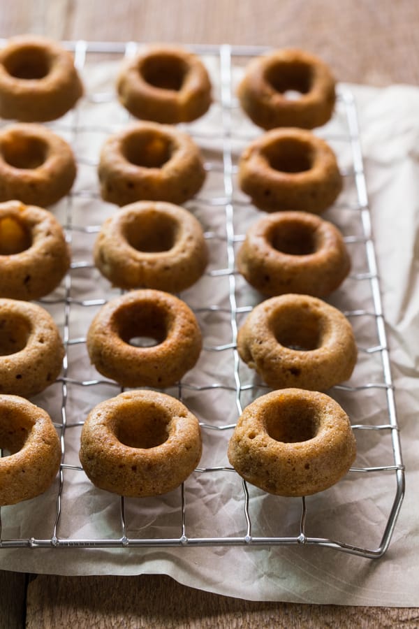 Vegan Apple Cider Doughnuts on a cooling rack