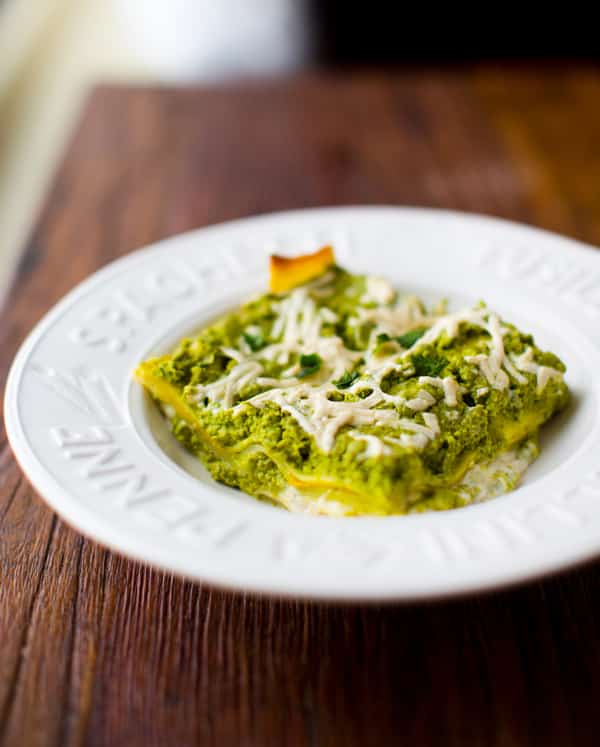 vegan Lasagna Verde being served in a white dish
