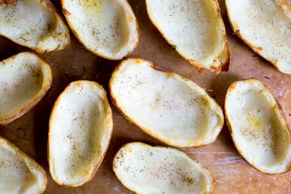 These delicious vegan potato skins are packed with Tex Mex flavor and are perfect for a party snack or appetizer!