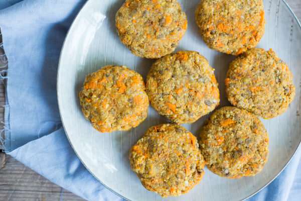 These Millet, Sweet Potato and Lentil Veggie Burgers are a delicious, healthy and light meal that are only about 400 calories each! Enjoy in a lettuce wrap for a filling meal that won't leave you feeling heavy!