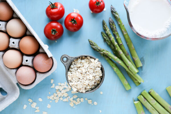 Savory Oatmeal with Fried Eggs, Asparagus and Tomatoes