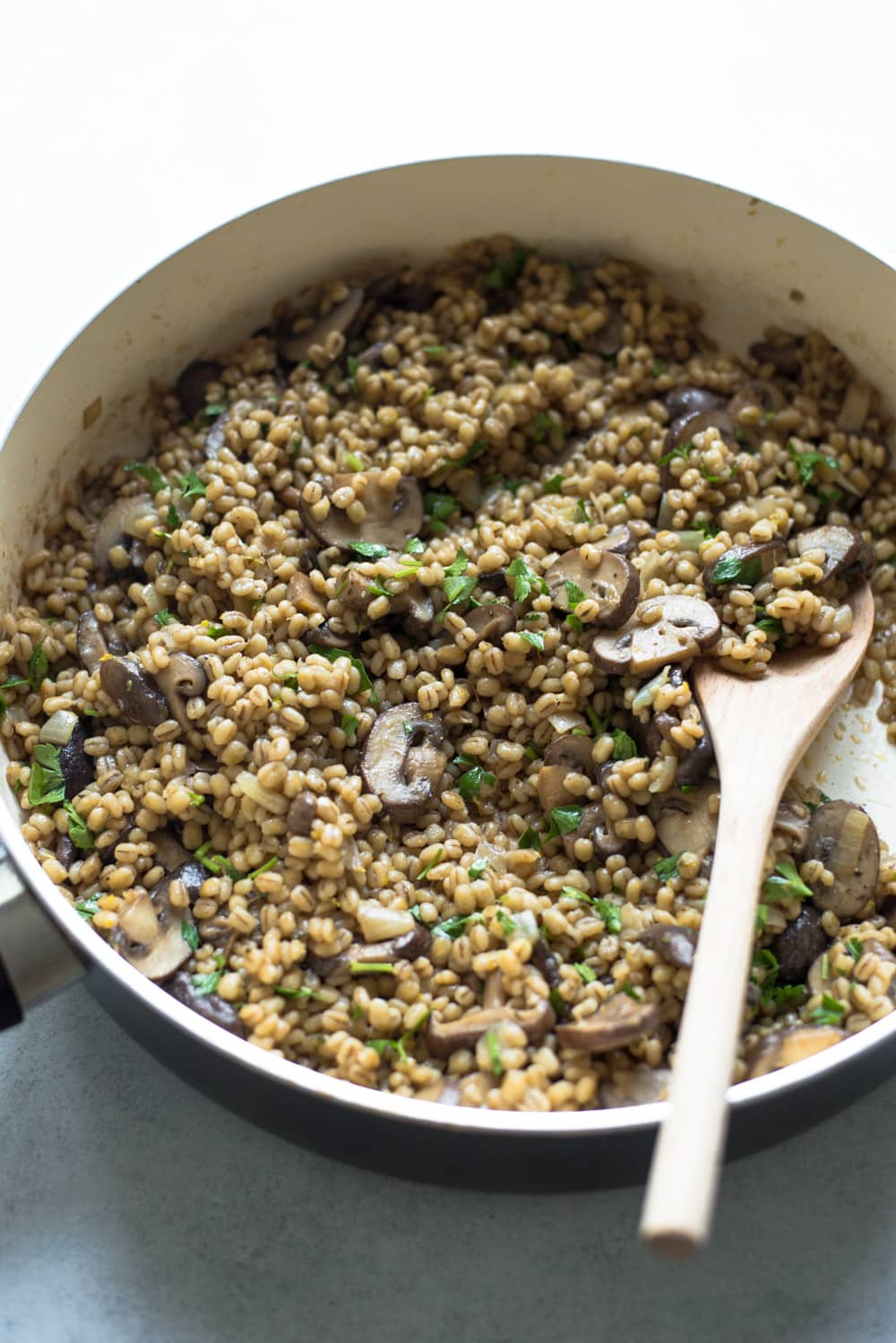 Mushroom Barley Pilaf being cooked in a large pan