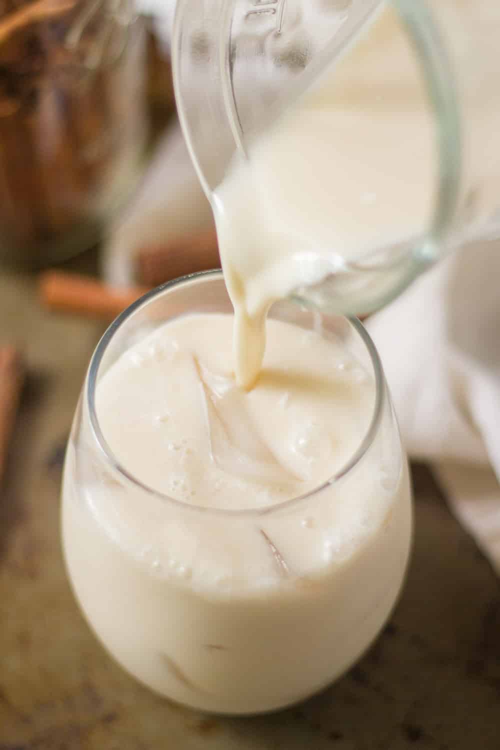 Coconut Horchata being poured into a glass