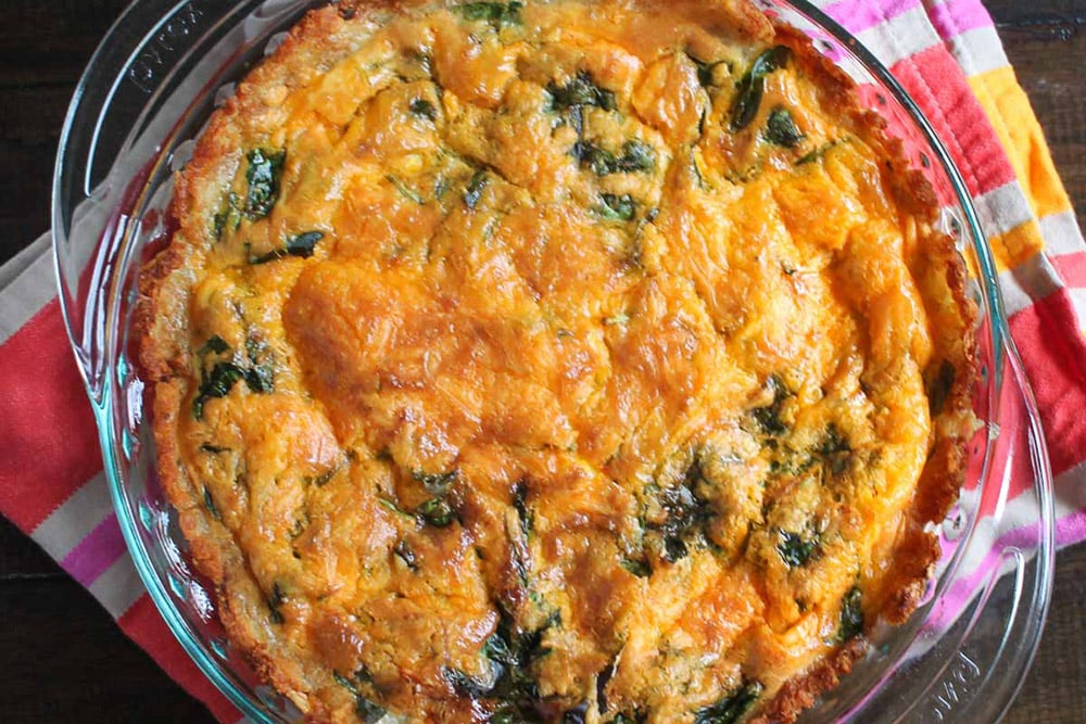 17 Creative Quiche Recipes: Spinach and Cheddar Tater Tot Quiche