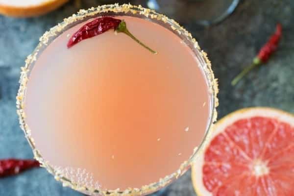 Refreshing Margarita Recipes to Cool You Down This Summer: Pink Grapefruit Margarita with Sriracha Salt