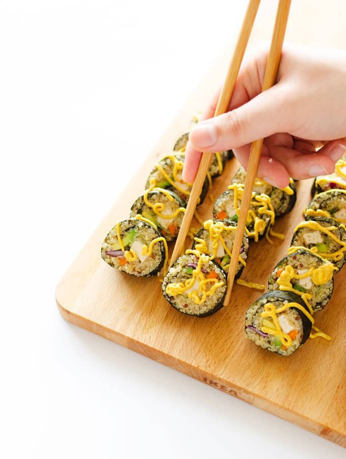 coconut tempura tofu vegetarian sushi rolls on a cutting board