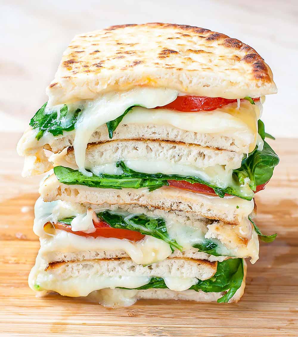 21 Mind-Blowing Grilled Cheese Sandwich Recipes: Spinach and Tomato Grilled Cheese Pitas