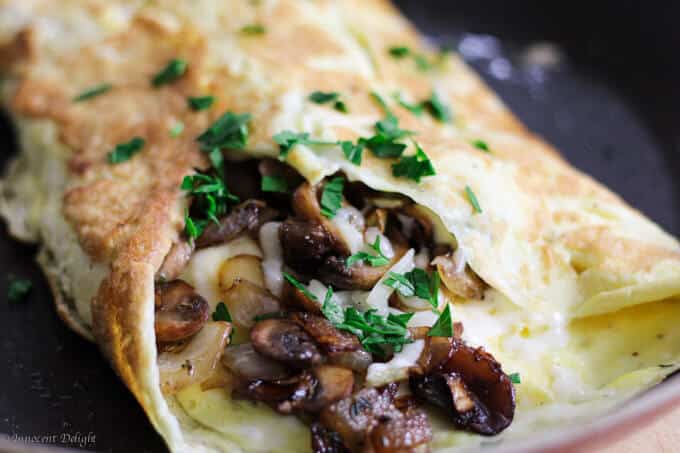 15 Irresistible Vegetarian Omelets to Make for Breakfast: Omelette with Mushrooms Onions and Mozzarella