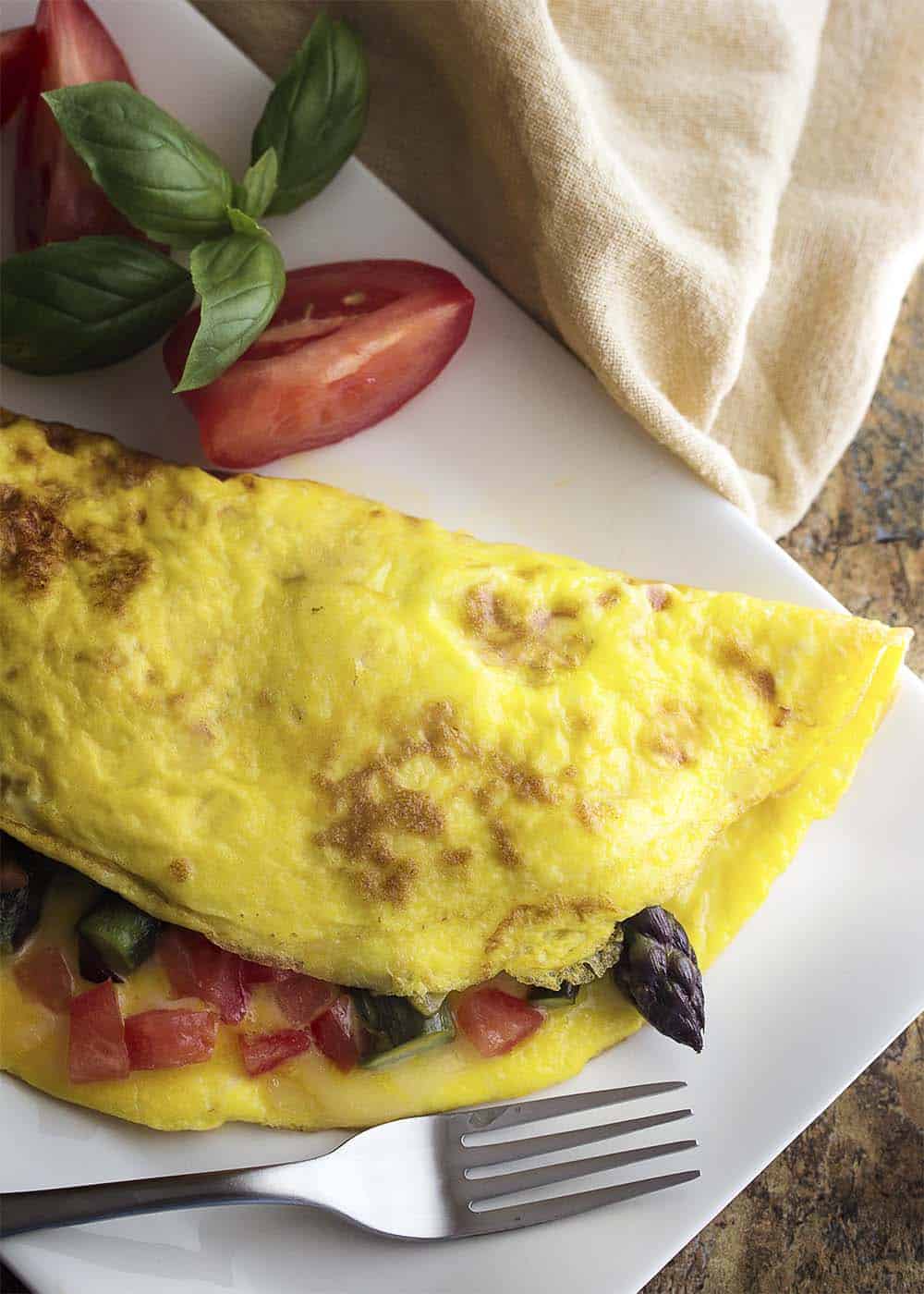 15 Irresistible Vegetarian Omelets to Make for Breakfast: Smoked Gouda Asparagus Omelette