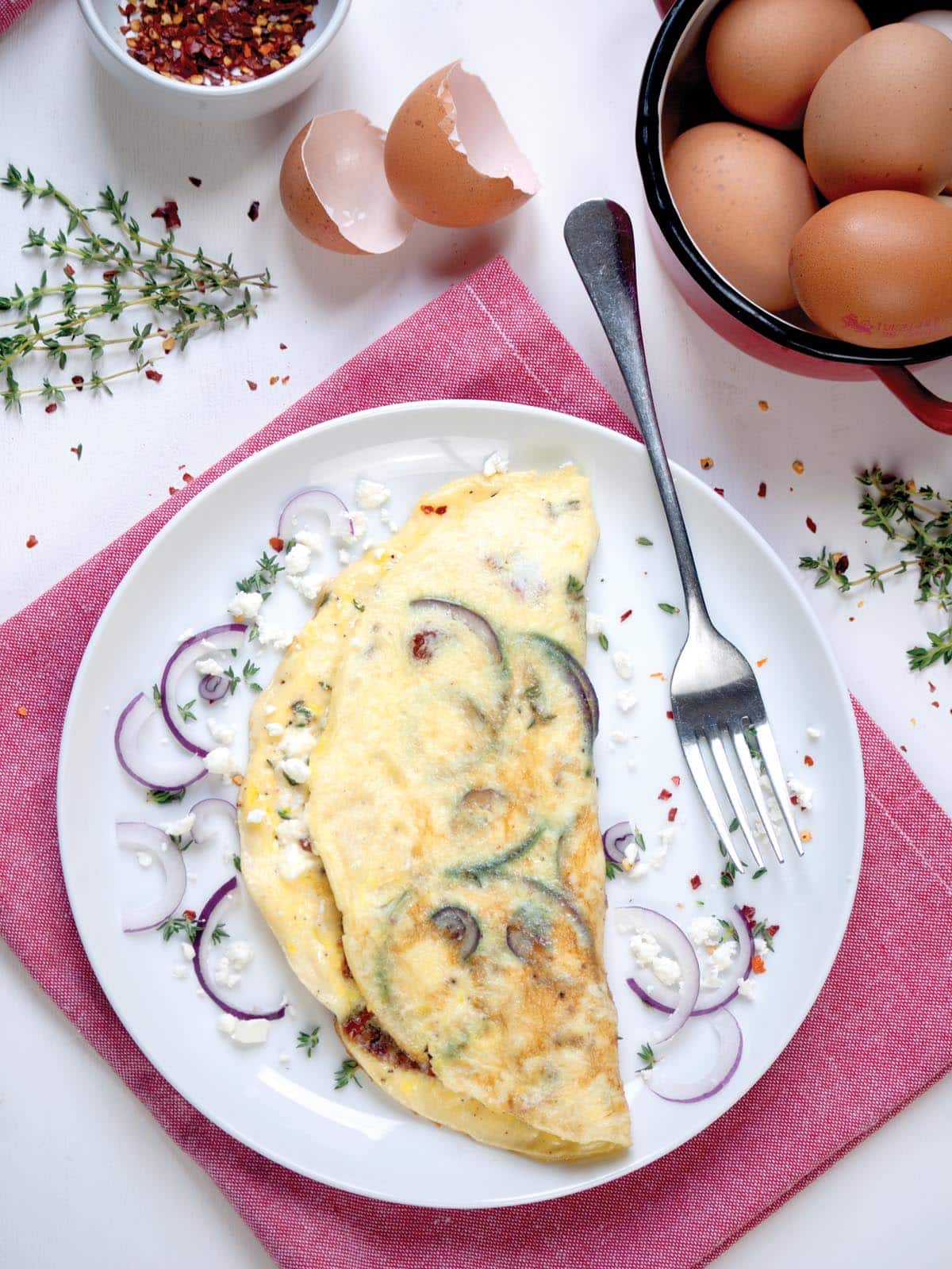 15 Irresistible Vegetarian Omelets to Make for Breakfast: Sun-Dried Tomato Feta Omelette