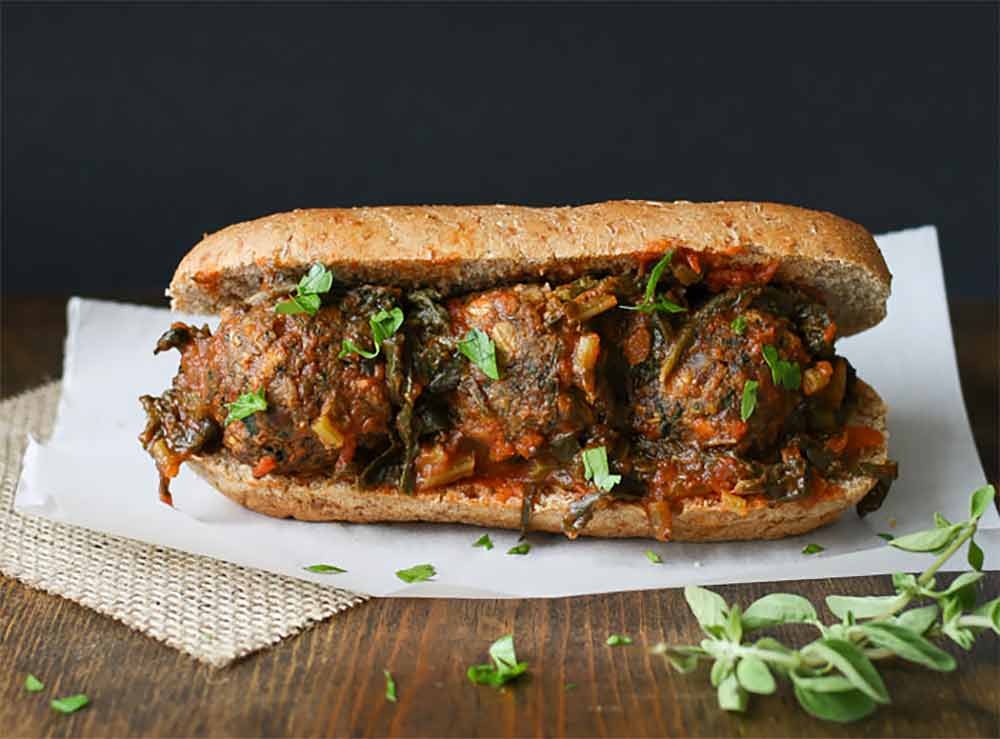 19 Recipes that Swap Lentils for Meat: Vegan Beanball Sub With Sautéed Kale Marinara