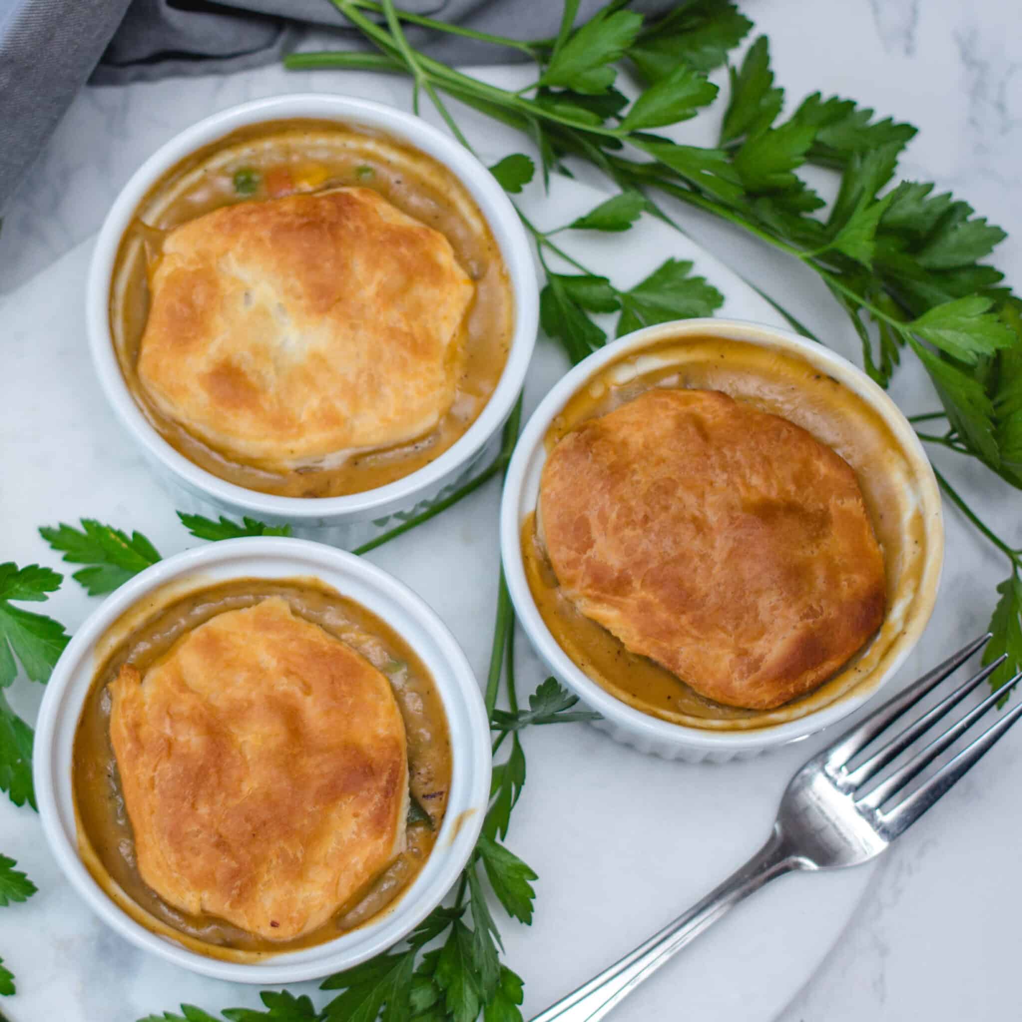 vegetarian pot pies being served on white linens