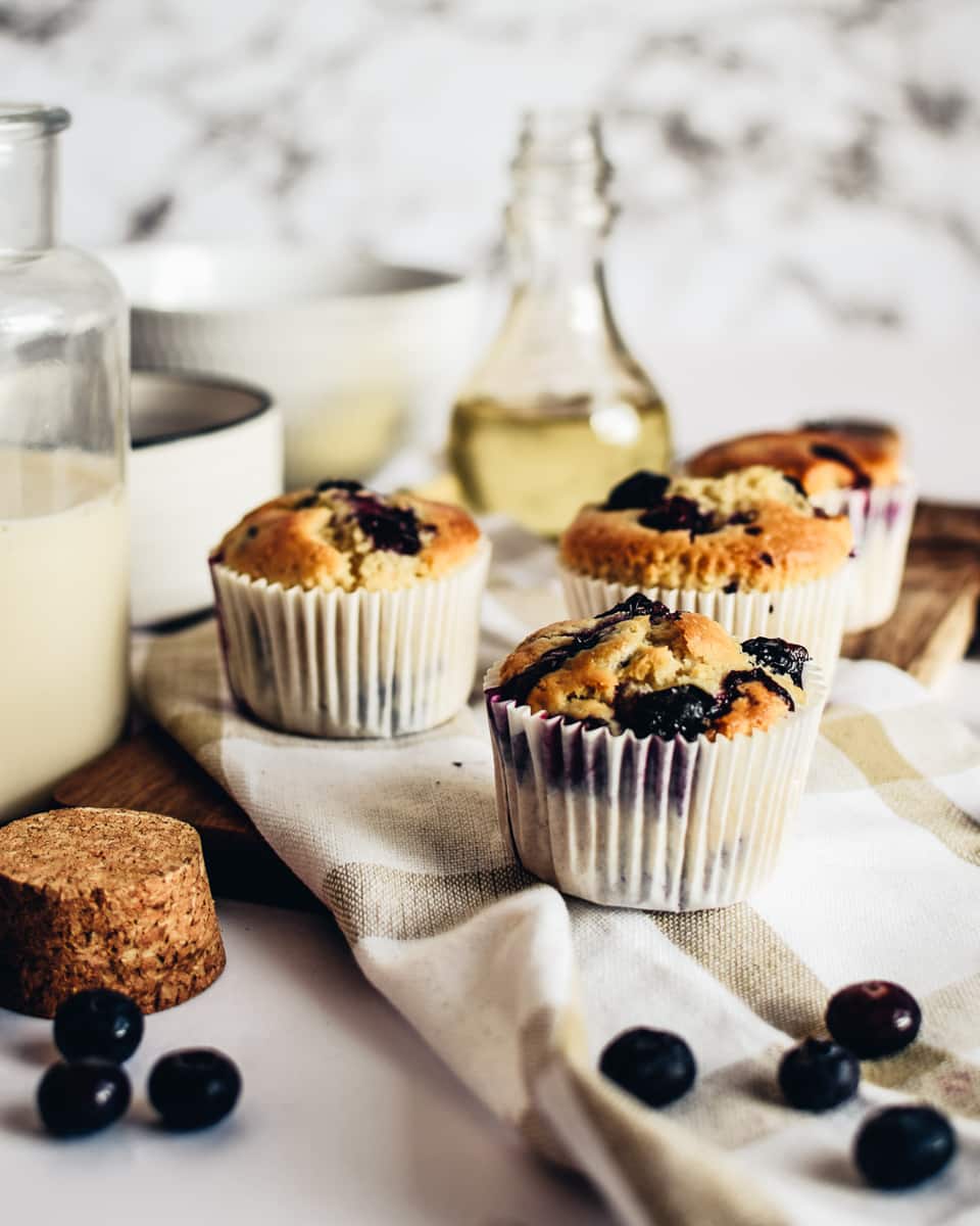 vegan blueberry muffins on a dishcloth 