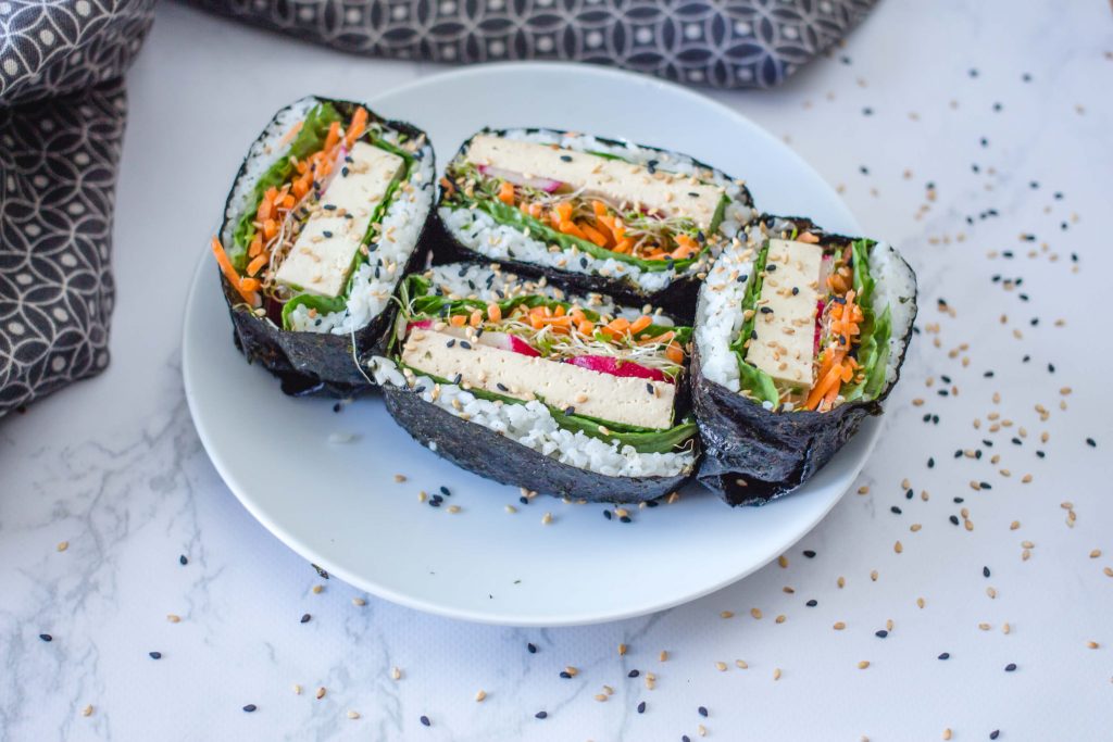 vegan sushi sandwich on a white plate