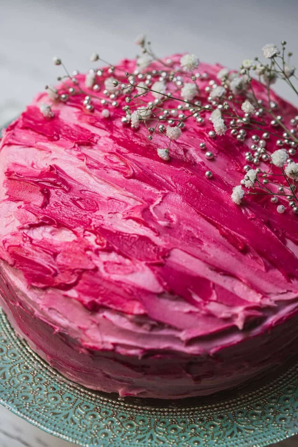 vanilla cake with bright pink frosting