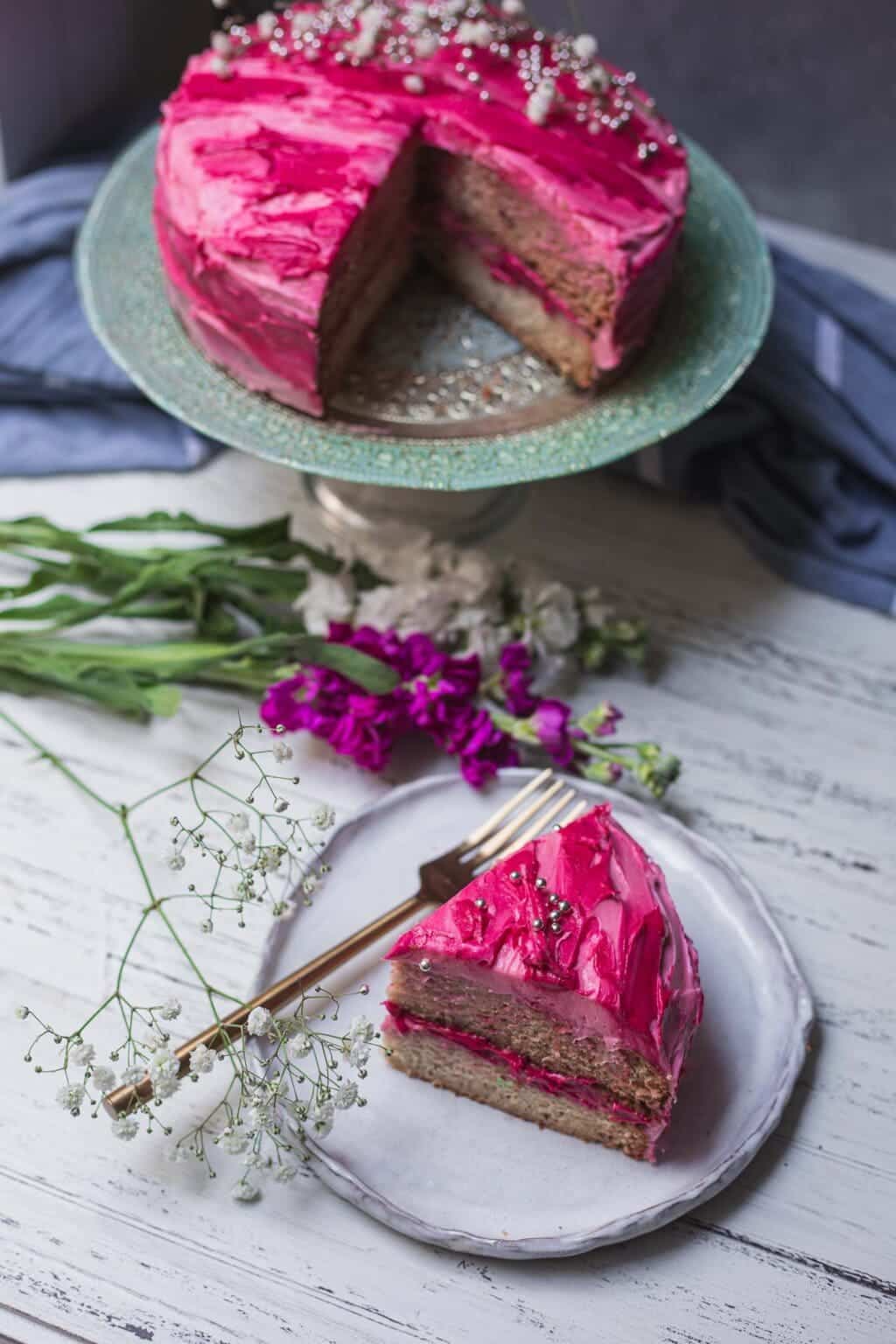 vegan vanilla cake on a cake stand