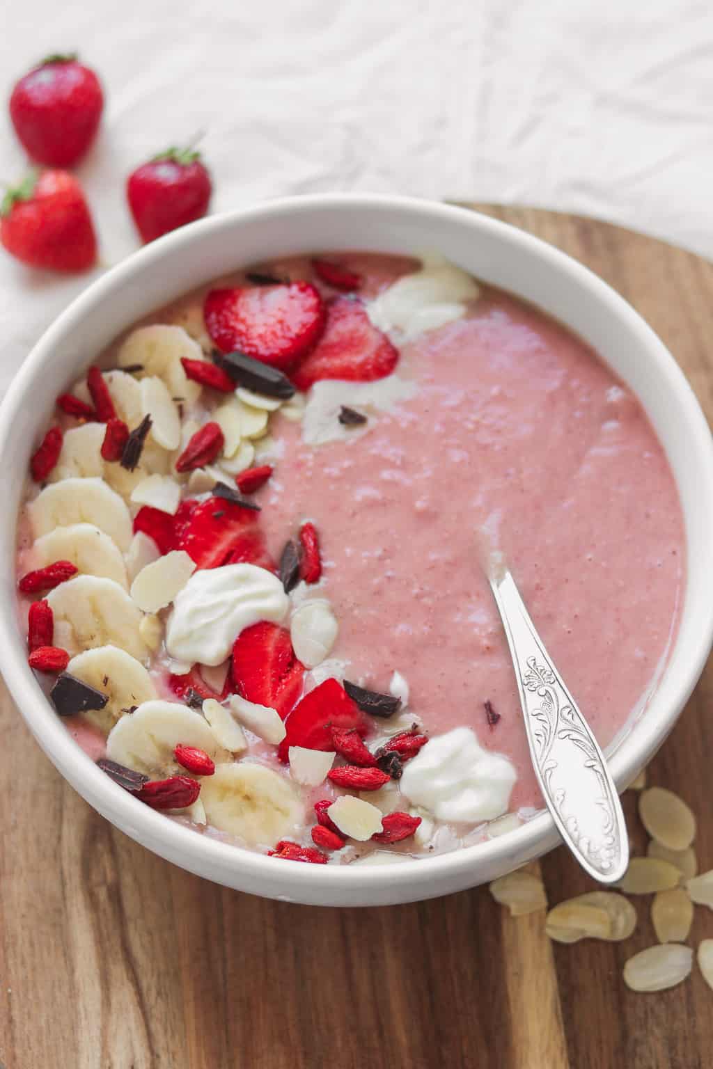 strawberry and banana vegan protein smoothie bowl 