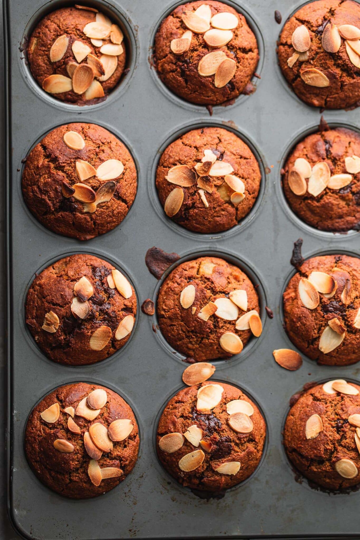gluten-free vegan pumpkin muffins in a baking tray