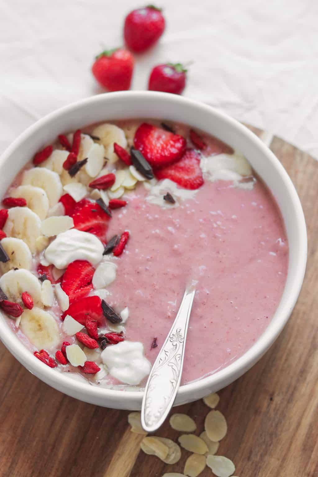 strawberry and banana vegan protein smoothie bowl