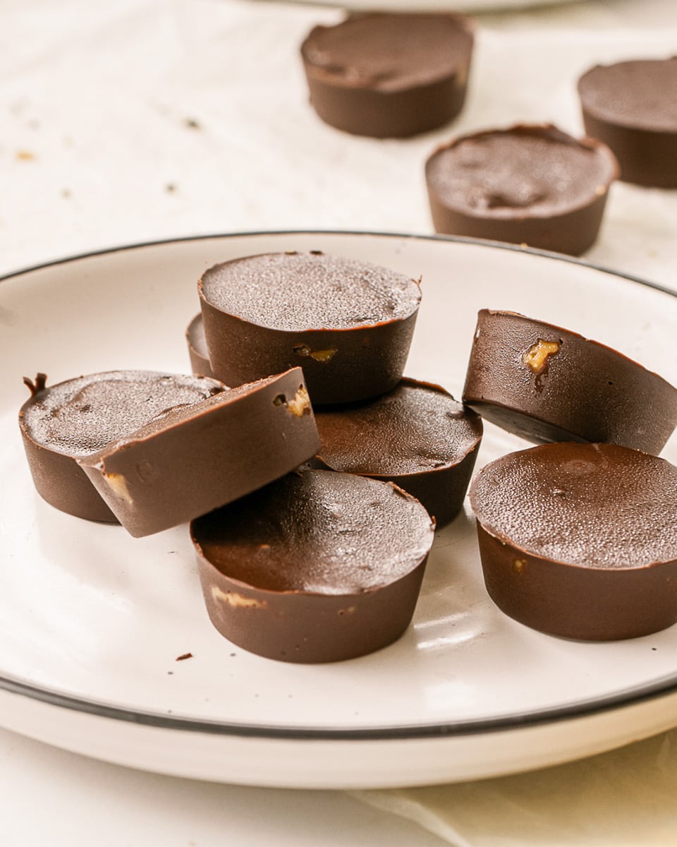 vegan peanut butter cups on a plate close up