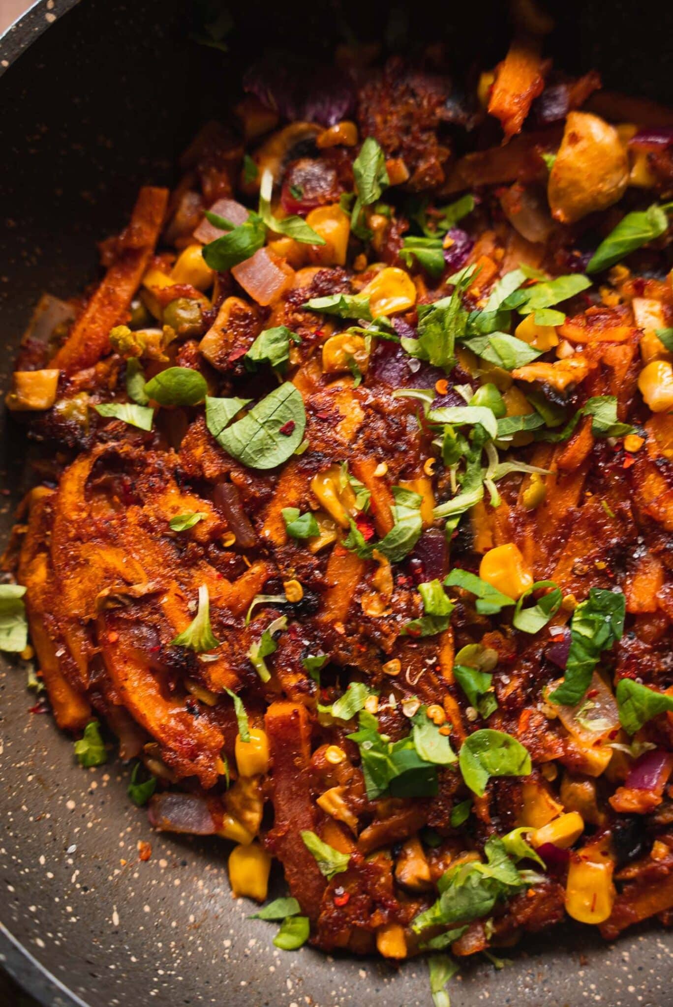 https://ohmyveggies.com/wp-content/uploads/2021/08/Sweet-potato-skillet-recipe-with-sweetcorn-scaled.jpg