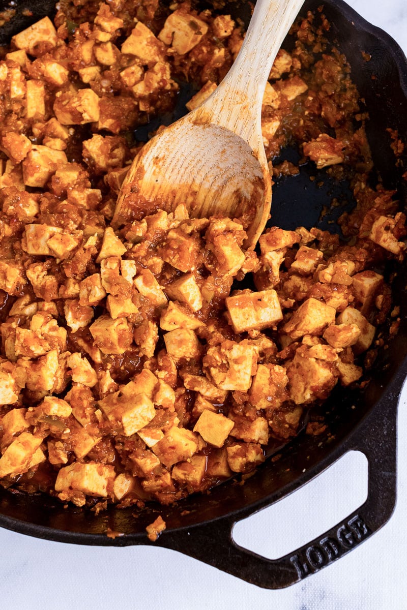 skillet of chipotle sofritas and wooden spoon