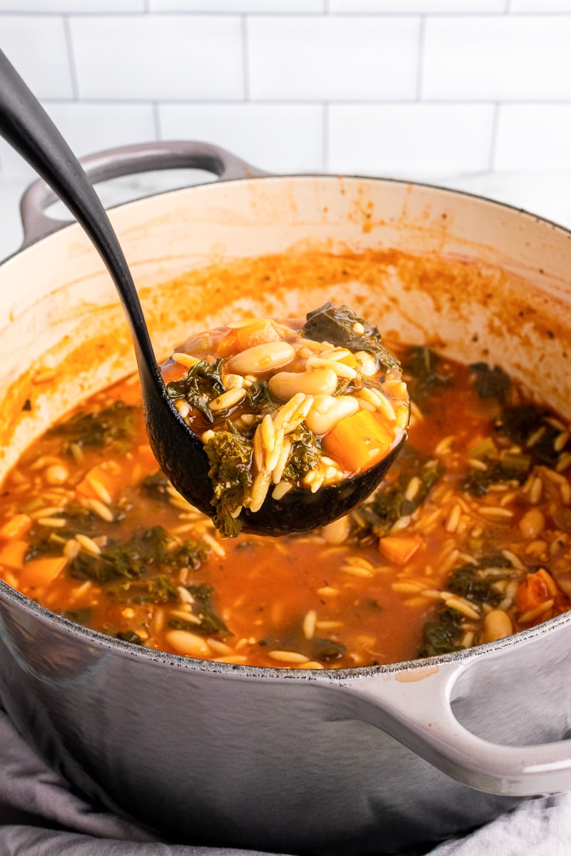 labeling a scoop of White Bean Kale Soup