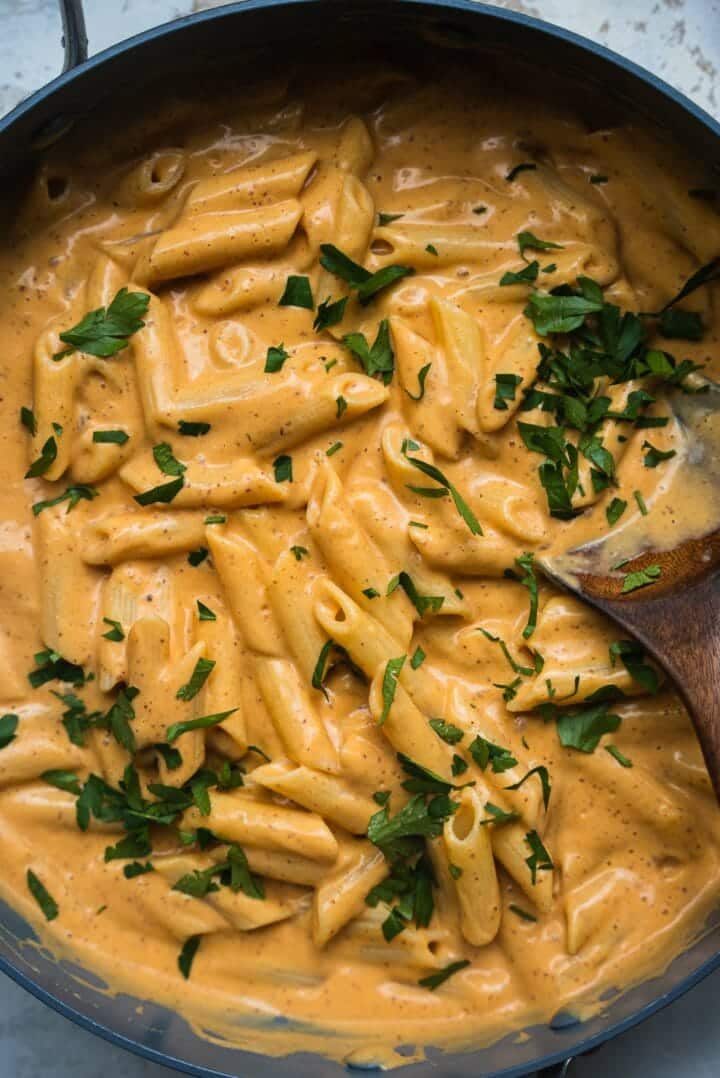Pasta with sweet potato sauce in a frying pan