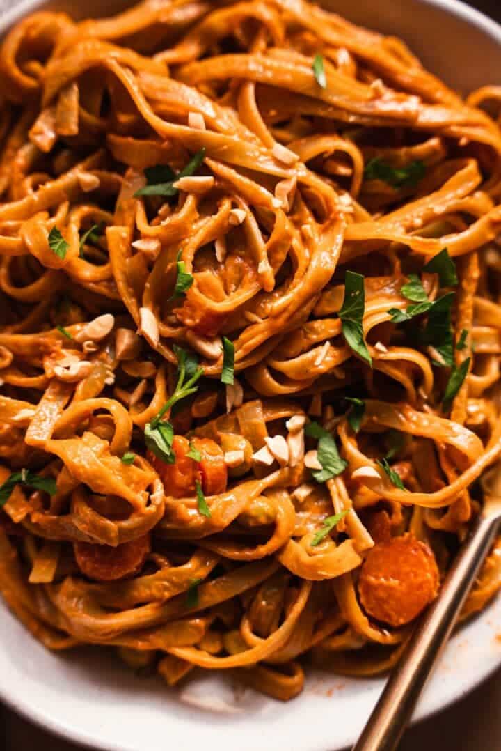 Bowl of noodles with carrots and peanut butter
