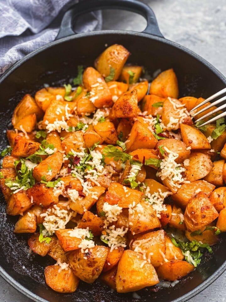 Breakfast potatoes with cheese and cilantro