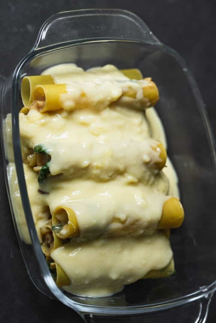 Cannelloni in a baking dish with dairy-free Bechamel