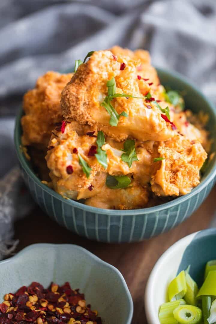 Cheesy cauliflower with breadcrumbs in a bowl