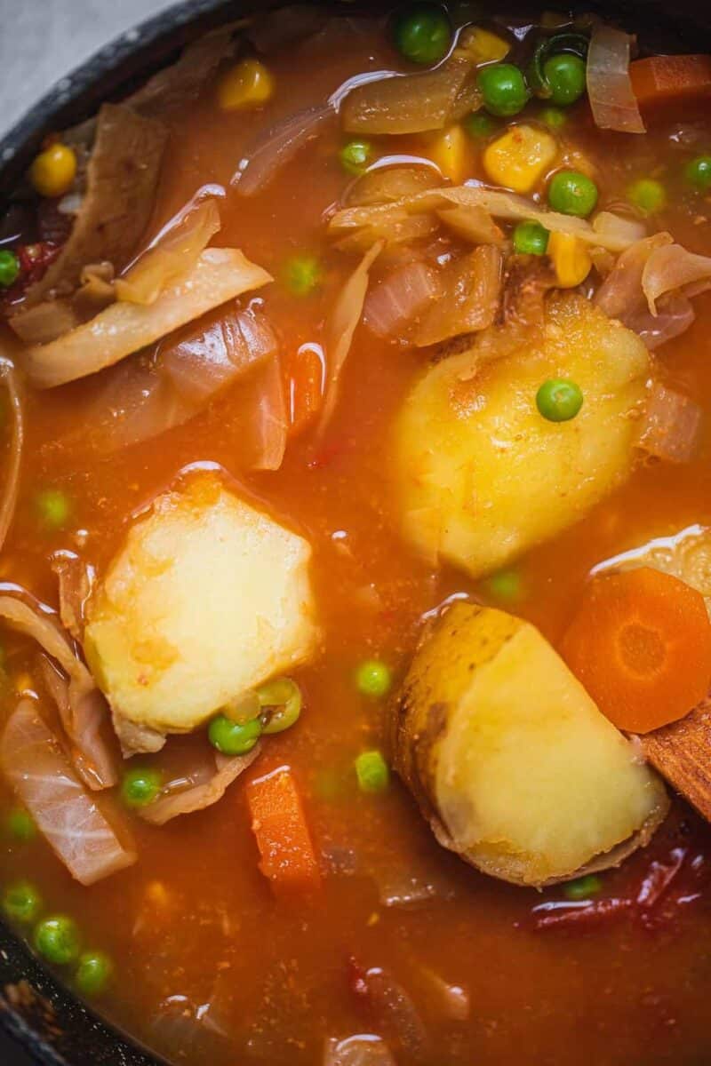 Closeup of a chunky potato soup in a saucepan