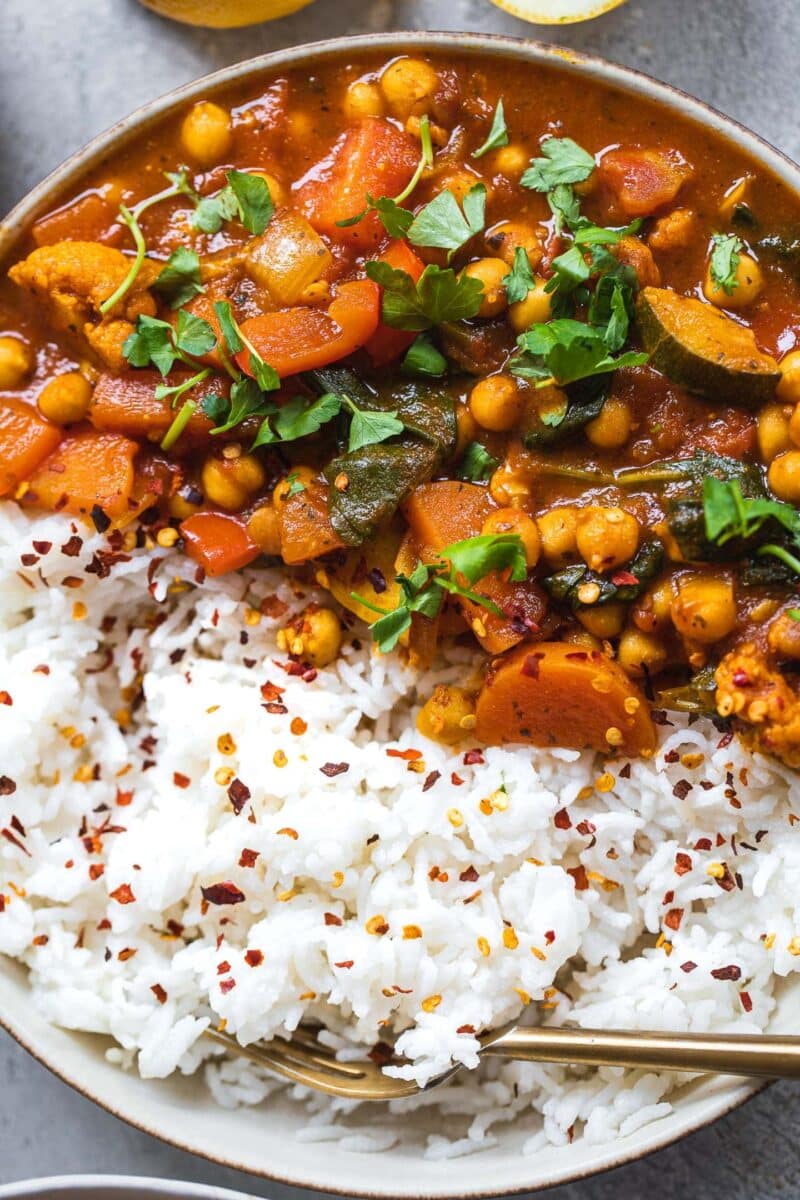 Closeup of a bowl of chickpea stew and rice