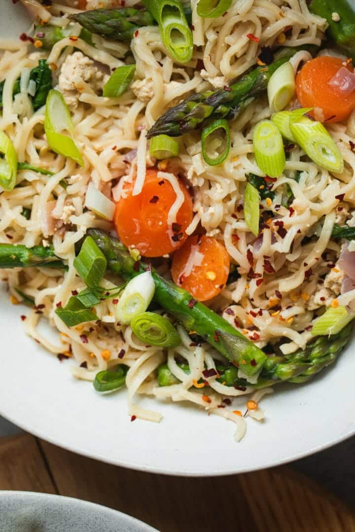 Closeup of a bowl with noodles and vegetables