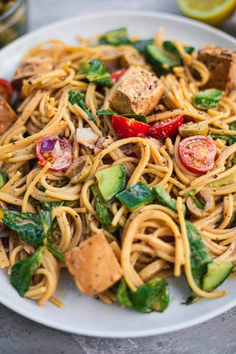 Plate of spaghetti salad with vegetables