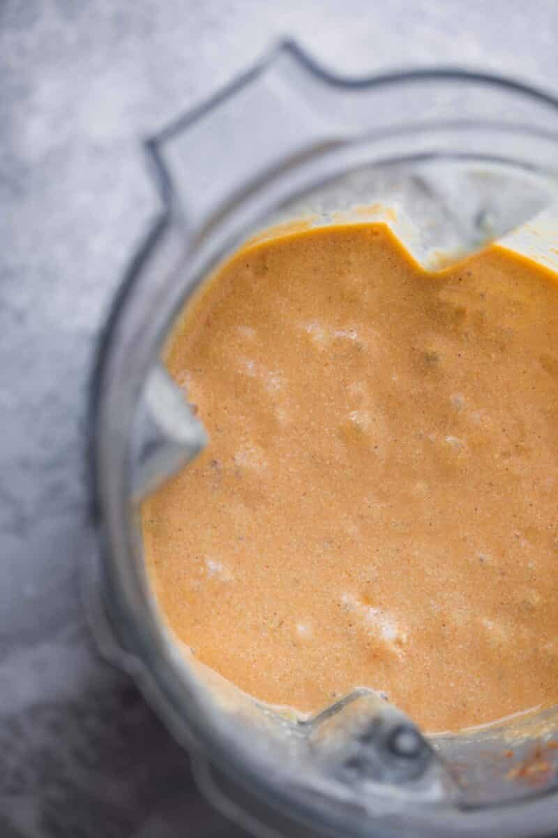 Creamy vegan sauce in a blender