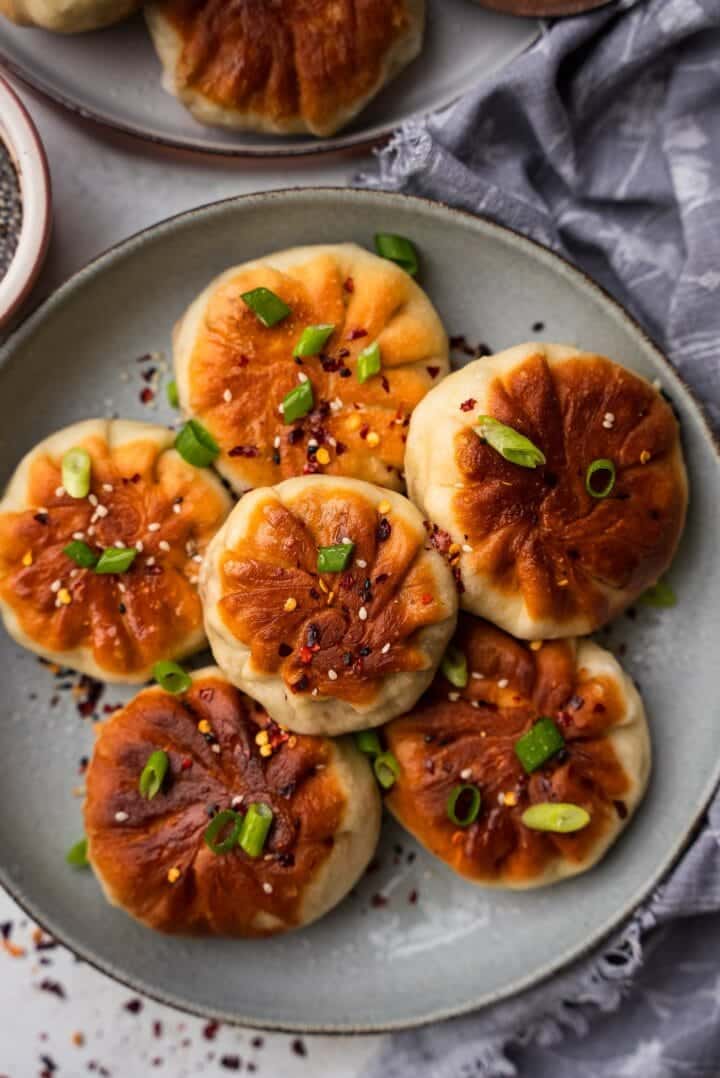 Crispy buns with scallions on a plate