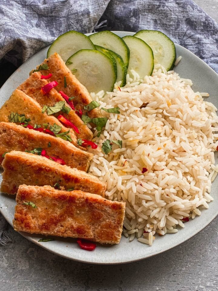 Crispy tofu and rice on a plate